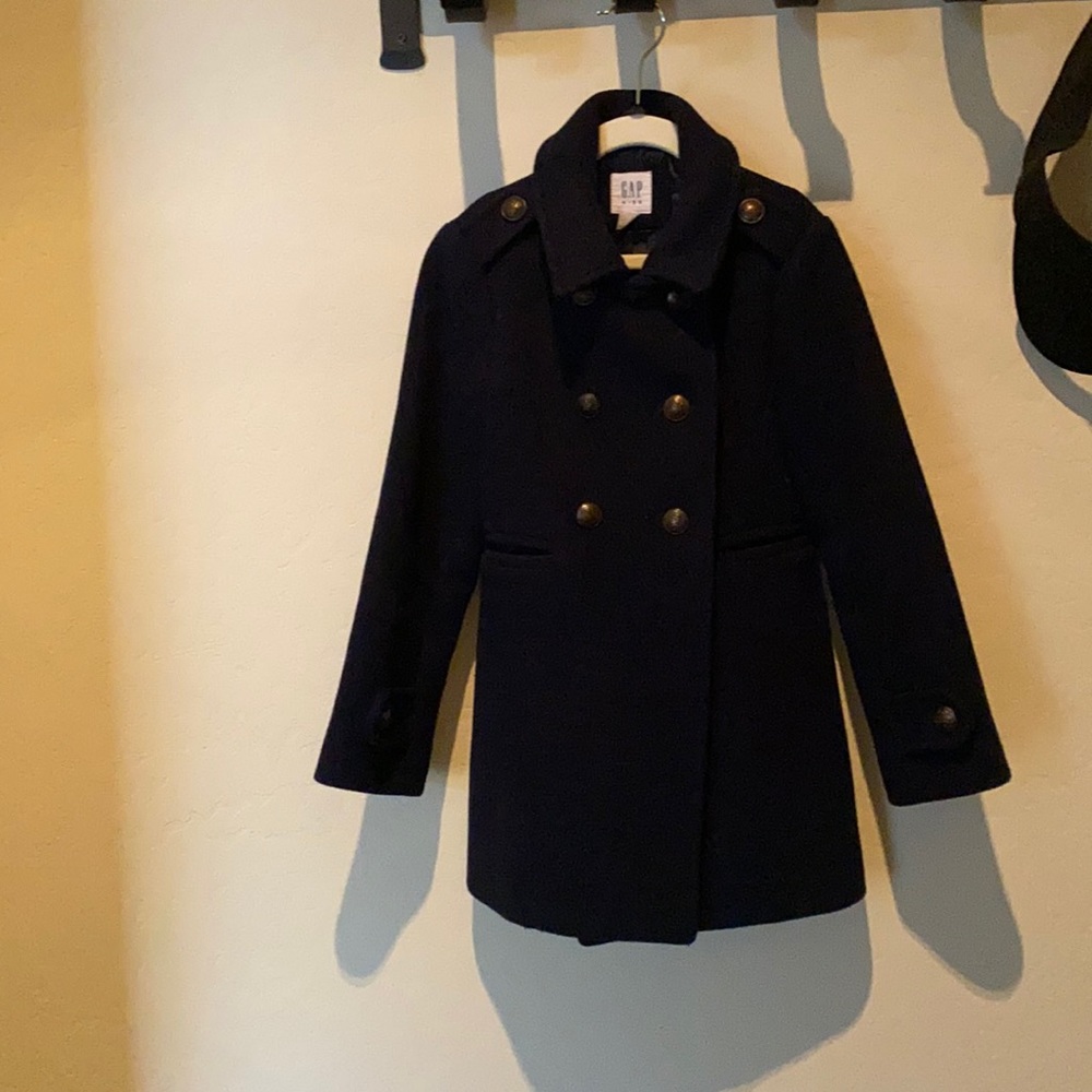 Navy blue coat.